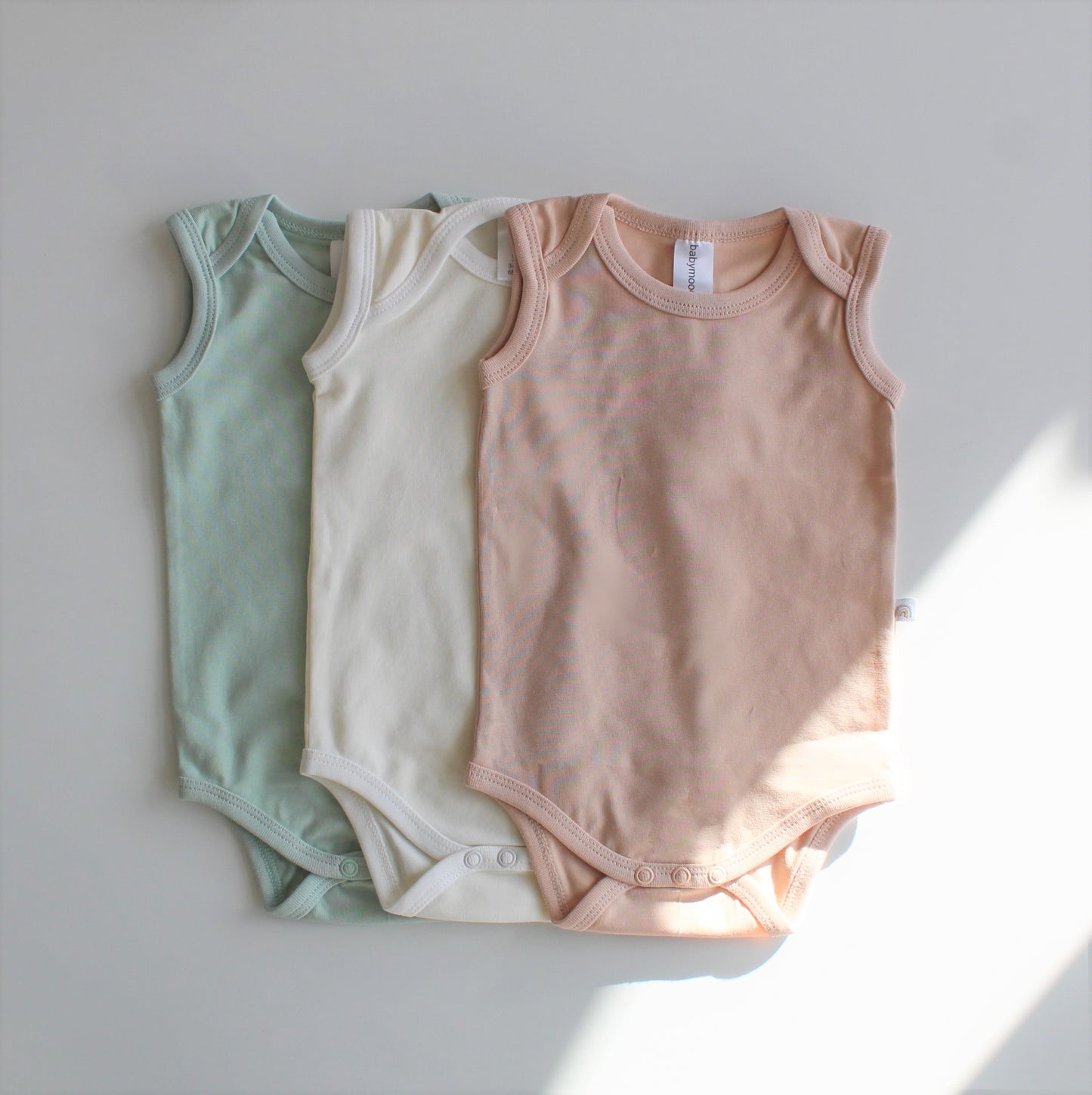Body without sleeves, organic cotton GOTS, old light green